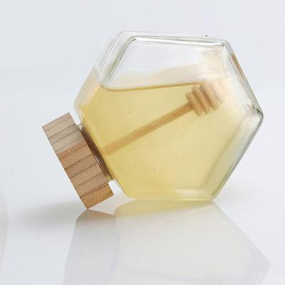 China Wholesale 100ML 220ML 380ML 500G Wholesale hexagonal glass honey jar with dipper for sale