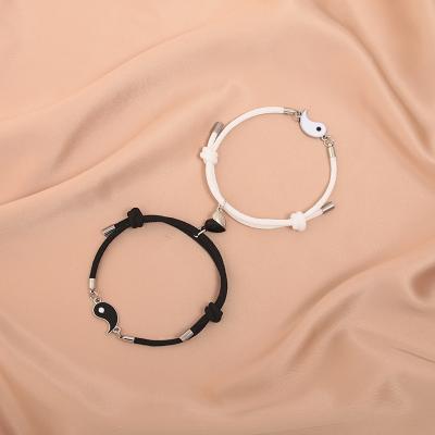 China Trendy Fashion Milan Rope Black and White Pair of Tai Chi Couple Bracelets A Magnet Wholesale Men's and Women's Bracelet Jewelry for sale