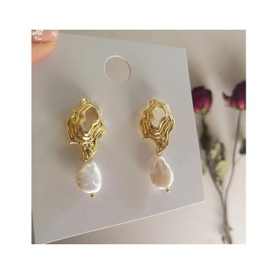 China Office / Career Flat Natural Freshwater Pearl Earrings For Women Wave Shape Gold Drop Cut White Baroque Jewelry Woman for sale