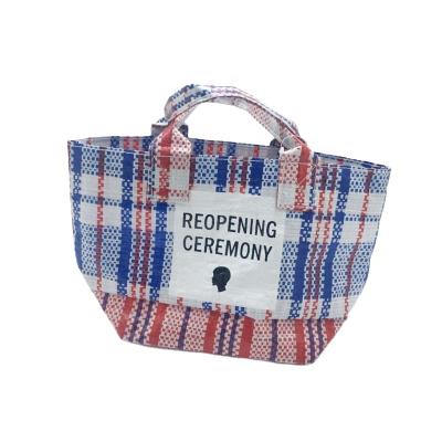 China Lady Lady Pvc Women Cosmetic Bag Shirt With Logo Woven Bag Film Covered Customized PP Woven Handbag Folding Shopping Bag for sale