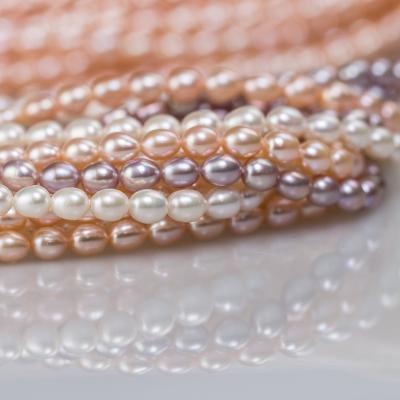 China CLASSIC Rice Shaped Colorful Freshwater Handmade Pearl Necklace Jewelry Loose Bead Material for sale