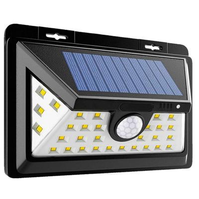 China New Model Waterproof IP65 Garden 34 LED Outdoor Solar Motion Sensor Light Outdoor Led Solar Light for sale