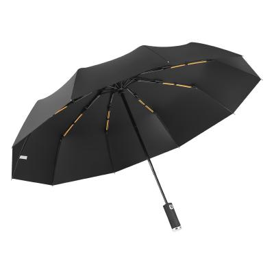 China Modern High Quality 3 Folding Umbrella Safety In Night LED Light Umbrella UV Proof Umbrella With Leather Cover for sale