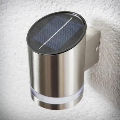 China IP 65 Aluminum Black Polycarbonate Solar Cylinder Slope Modern Solar Wall Lights Outdoor Sconce for sale