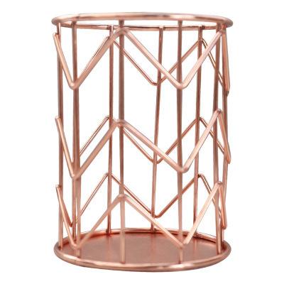 China Rose Gold Metal Hollow Desktop Stocked Makeup Tool Storage Jars Home Decor Wholesale for sale