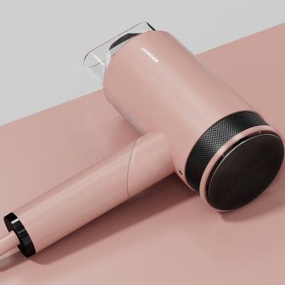 China Manufacturer 1800W Negative Ionic Professional Foldable Fast Drying Machine Pink Hair Dryer for sale