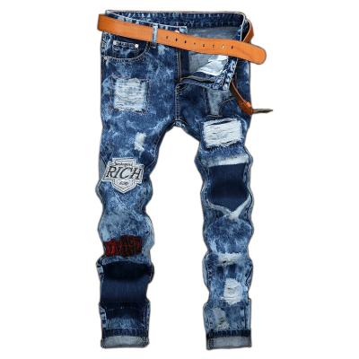 China Men's Hole Patch Men's Slim Pants Breathable High Quality Denim Jeans Washed Ripped Straight Mens Badge Jeans for sale