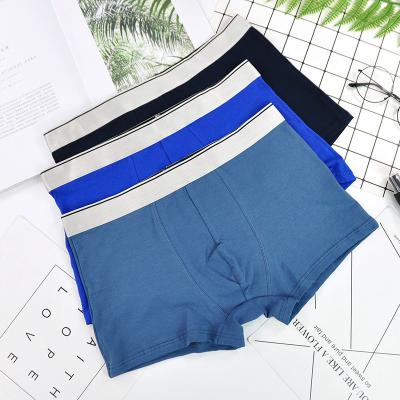 China Seamless Mens Cotton Underwear Boxer Shorts Breathable Sports Briefs Boys Mid Waist Shorts Japanese Sweat-absorbent Panties for sale