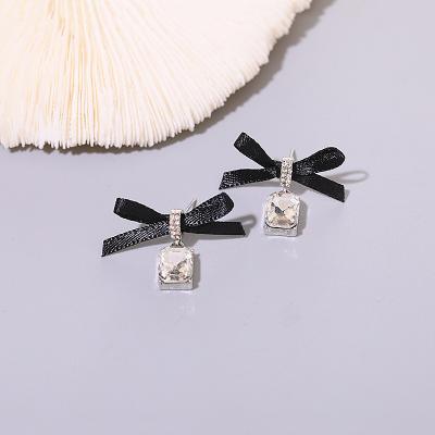 China Beautiful New S925 Needle Bowknot Crystal Drop Earrings Environmental Friendly Silver Stud Earrings For Girl And Women for sale