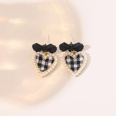 China Hot Sale Environmentally Friendly Pearl Earrings Heart Bow Knot Stud Earrings For Women for sale