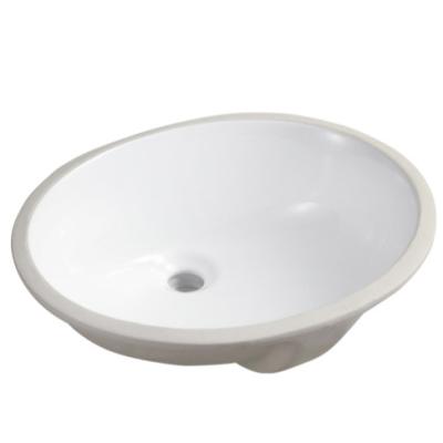 China Easy Clean Wholesale Ceramic Sanitary Ware Undermount Cabinet Sink Oval White Ceramic Hospital Sink Under Counter Sink for sale