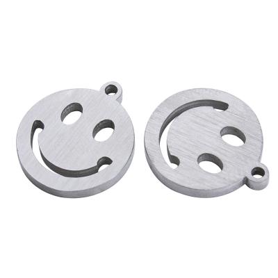 China Environmental Friendly Double Sided Stainless Steel Laser Cut Piece Double Hole Smile Face Pendant Finely Polished Bit for sale