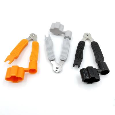 China Fashionable 3 in 1 Multifunctional Guitar Tool Guitar Accessories Guitar String Winder for sale