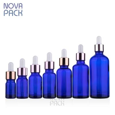 China 5ml 10ml 15ml 20ml 30ml 50ml 100ml Cobalt Blue Serum Glass Bottle Cosmetic Essential Oil Tincture Dropper Bottles for sale