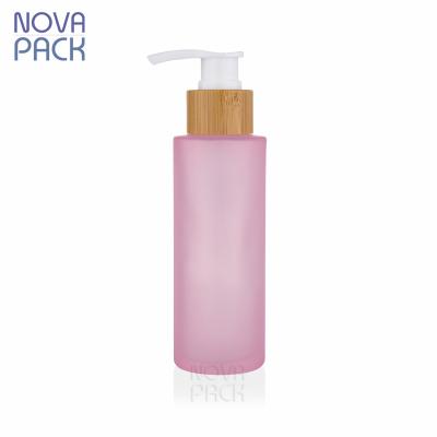 China 100ml Pump Body Lotion Detergent Bottle Eco-Friendly Bamboo Cosmetic Bottle Cosmetic Pink Glass Gel Packaging Bamboo Bottles for sale