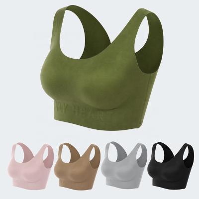 China Top Selling QUICK DRY Women Padded Sleep Top Vest Solid Traceless Laser Cut Wireless Seamless Sleep Bra for sale