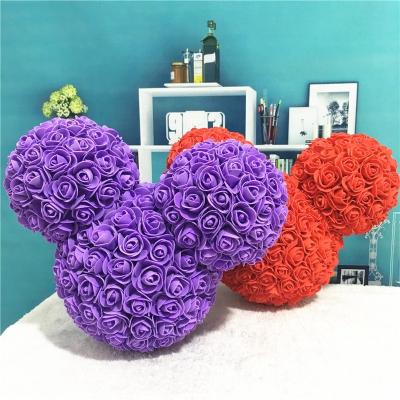 China Handmade Artificial Gift PE Foam Rose Flower Mickey Mouse Ears Bouquet With Wrapping Flower Paper for sale