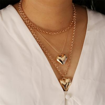 China Boho Trendy Multilayer Choker Chain Metal Gold Necklace Heart Pendant Necklace For Women for sale