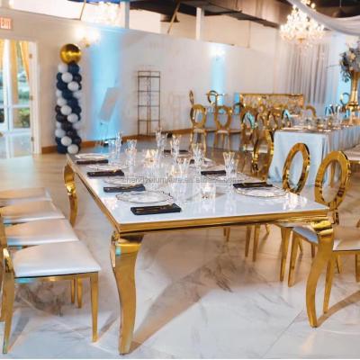 China Modern Wedding Furniture Metal Rectangle Gold Stainless Steel Glass Dining Tables for sale