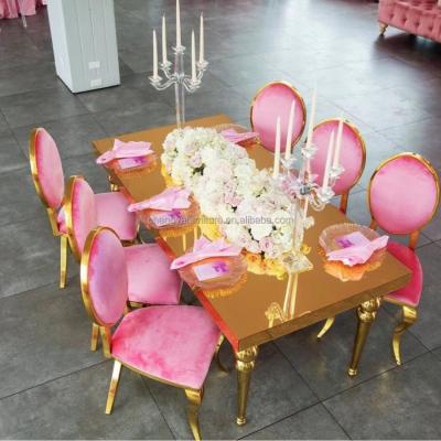 China Modern Romantic Wedding Stainless Steel Frame Gold Top Dining Table And Chair Sets for sale