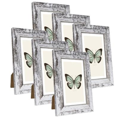 China Durable Eco-friendly 4 Packs Distressed 4x6 White Wall Mount Or Table Top With High Definition Glass Hot Sale Custom Fashionable Wooden Photo Frame for sale