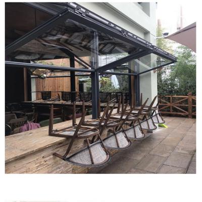 China Modern Frameless Double Folding Stained Glass Folding Glass Window For Shop Cafe for sale