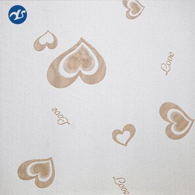 China Anti-static Cheap Heart Pattern Jacquard Knitting Fabric Upholstery Mattress Fabric For Sofa for sale