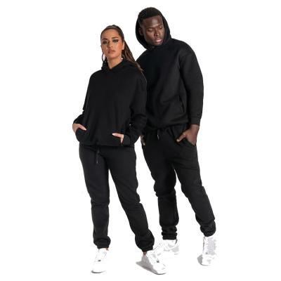 China Custom Anti-Wrinkle Hooded Logo 2 Piece Loose Tracksuit Set Hooded Men's Jogging Suit Sweatsuit Unisex Set for sale