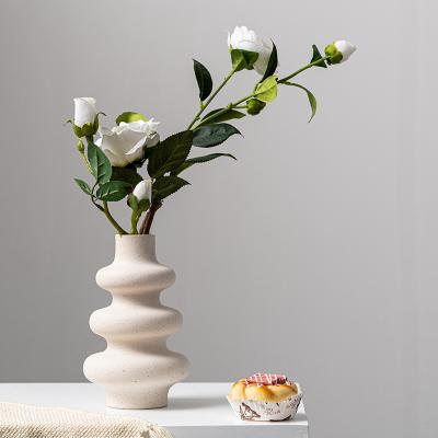 China New Modern Creative Plain Burning Vases Frosted Grain Ceramic Flower Arrangement Ornaments for sale