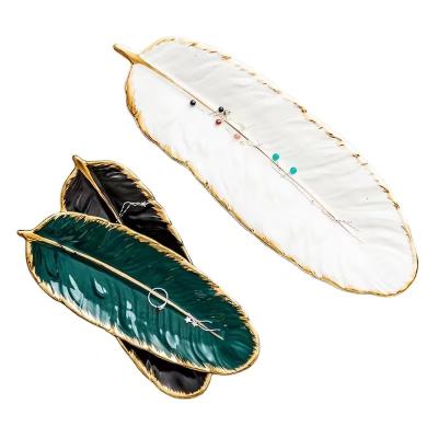 China Phnom Penh Viable Nordic Feather Dish Snack Dish Fashion Style Ceramic Creative Leaf Dish for sale