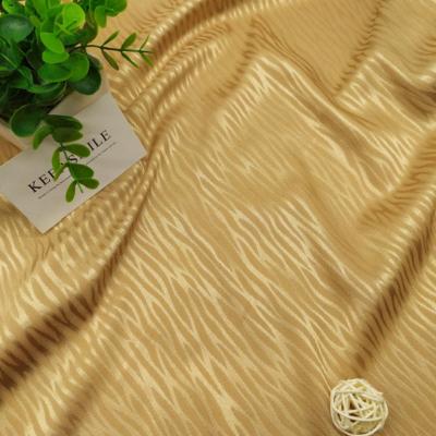 China Pure Zebra Patterned Jacquard Stof Pajamas Imitation Robes Polyester Satin Jacquard Fabric Manufacturers Directly Silk Fabrics for sale