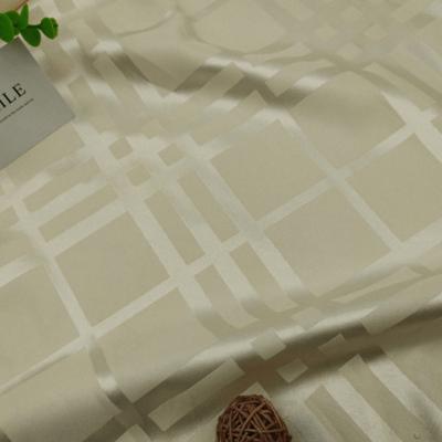 China Pure stock wholesale pure jacquard satin lattice jacquard stretch fabric imitation silk diagonal shirt printed fabrics for sale