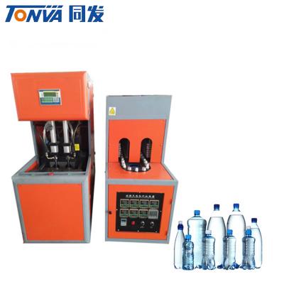 China High Speed ​​Semi Automatic Bottle Manual 2 Cavities PET Bottle Blow Molding Machine for sale