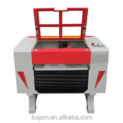 China Laser Engraving 2016 Whole Direct Sale Hot Promotion Factory Sale Fabric MDF 4030 CO2 Laser Engraving Machine Acrylic Wood Leather Price for sale