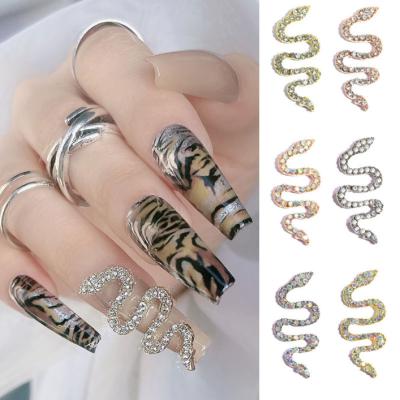 China 2022 hot sale nail art decoration nail art snake charm snake with diamond 3d metal nail decoration nail ornament for sale