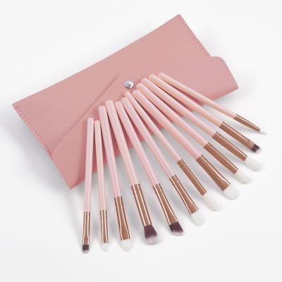 China Angular Blush Pink Vegan Eyeshadow Makeup Set Brush Tools Wholesale 12 Pcs Professional Set Brush Eyeshadow Makeup Brushes Pink for sale