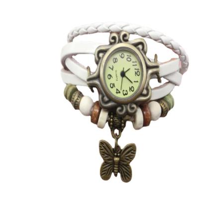 China Small Three Needle YST Good Quality Women Leather Retro Angel Wring Butterfly Pendant Vintage Wooden Strap Beads Wristwatches for sale