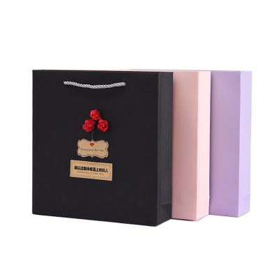 China YST Customized Handmade Lovely Low Price T-shirt Custom Logo Cardboard Gift Luxury Packaging Box With Ribbon Ties for sale