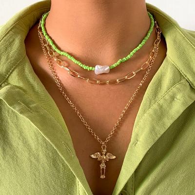 China Other YST Vintage Cross Jesus Portrait Necklace Plain Pearl Imitation Pearl Woven Necklace for sale