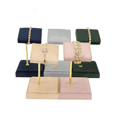 China Custom Luxury YST Jewelry Display Suede Leather Metal Watch Display Bracelet Display Stand Modern Luxury Metal Stand for sale