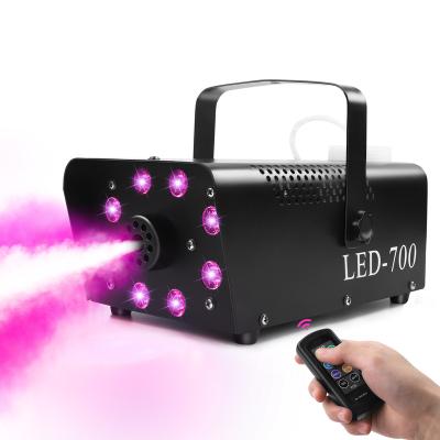 China Easy Installation 700W LED FOG Smoke Machine with 8PCS RGB 3 in 1 LED Stage Light for sale