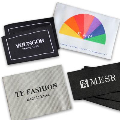 China Washable Sew On Apparel Fabric Weaving Custom Private Label Maker Own Logo Woven Labels For Clothes for sale