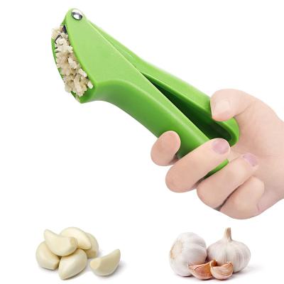 China Sustainable Wholesale High Quality Steel Portable Garlic Press Kitchen Accessories PP for sale