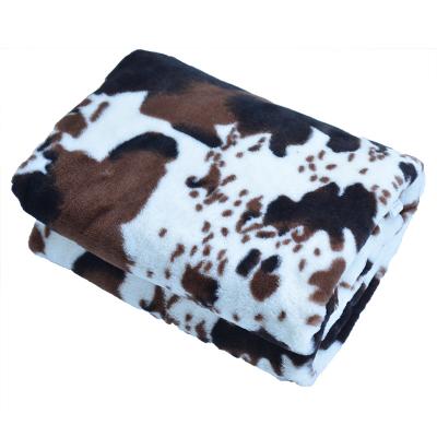 China Anti-pilling Cowhide Print Double Layer Mink Blanket Brown White Fleece Polyester Faux Fur Throw Blanket For Home for sale