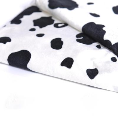 China Waterproof Polyester Cow Printed Soft Velboa Fabric for sale