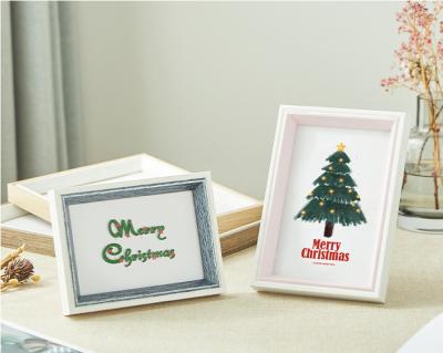 China 2022 New Customized Handmade Home Photo Simple Design Iron Family Tree Decoration Photo Frame Christmas Tree Wholesale View for sale