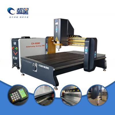 China 6090 Máquina de encaminamiento por CNC de madera de escritorio con estructura de hierro fundido Industria publicitaria en venta