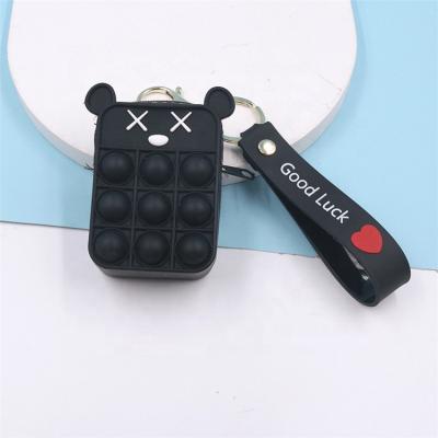 China New Black Squeezable Kids Mini Bubble Sensory Silicone Wallet Case Poppings Wiggles Key Chain Toy Bag Coin Purse for sale