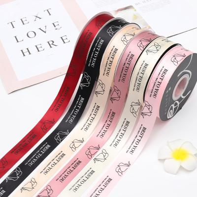 China Hengcool 2.5cm Gold Foil Rose Printing 100% Polyester Gift Decoration Satin Ribbon for sale