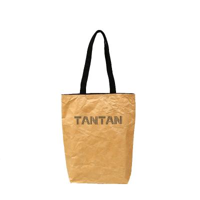 China Recyclable Wholesale Gift Purse Single Shoulder Storage Shopping Paper Bag for sale